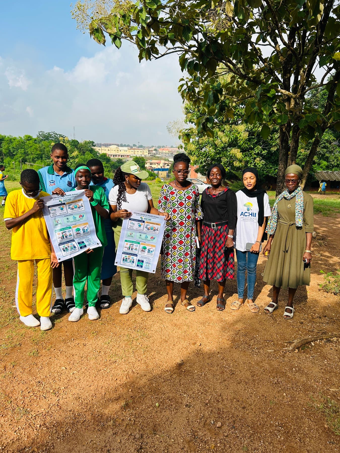 ACHII team and students with climate-health infographics
